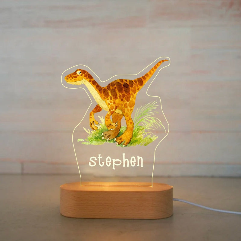 Veilleuse dinosaure personnalisée raptor avec prénom gravé, plaque acrylique allumée sur socle en bois