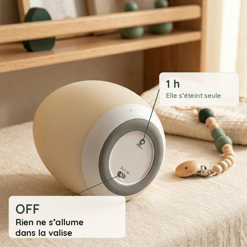 Veilleuse maternité oeuf vue de dessous : interrupteur OFF pour la valise et bouton minuteur 1 h, Tendre Veilleuse