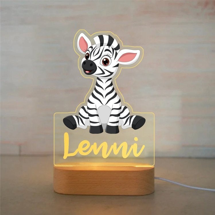 Veilleuse zèbre personnalisée avec prénom gravé, plaque acrylique allumée sur socle en bois