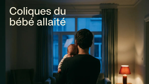 Coliques du bébé allaité : parent apaisant son bébé lors d'une crise du soir sous lumière rouge tamisée, Tendre Veilleuse