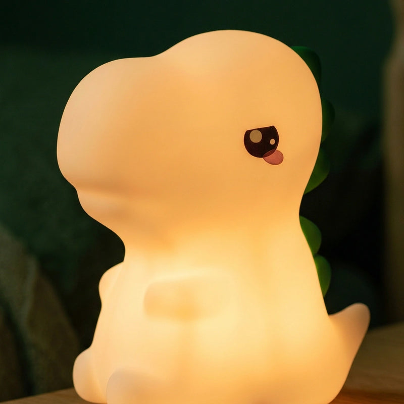 Veilleuse dinosaure portable allumée dans l'obscurité, diffusant une lumière douce et apaisante pour le sommeil de l'enfant, Tendre Veilleuse