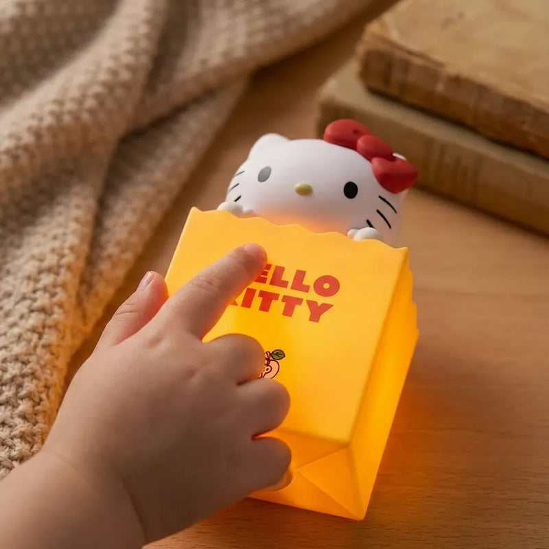 Veilleuse Hello Kitty sac silicone jaune tactile main enfant allumee lumiere orange chaude Tendre Veilleuse