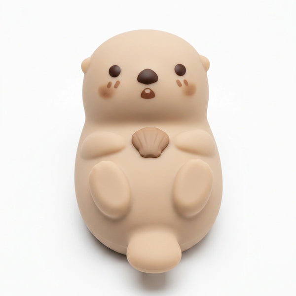 Veilleuse loutre en silicone souple rechargeable USB eteinte sur fond blanc — Tendre Veilleuse
