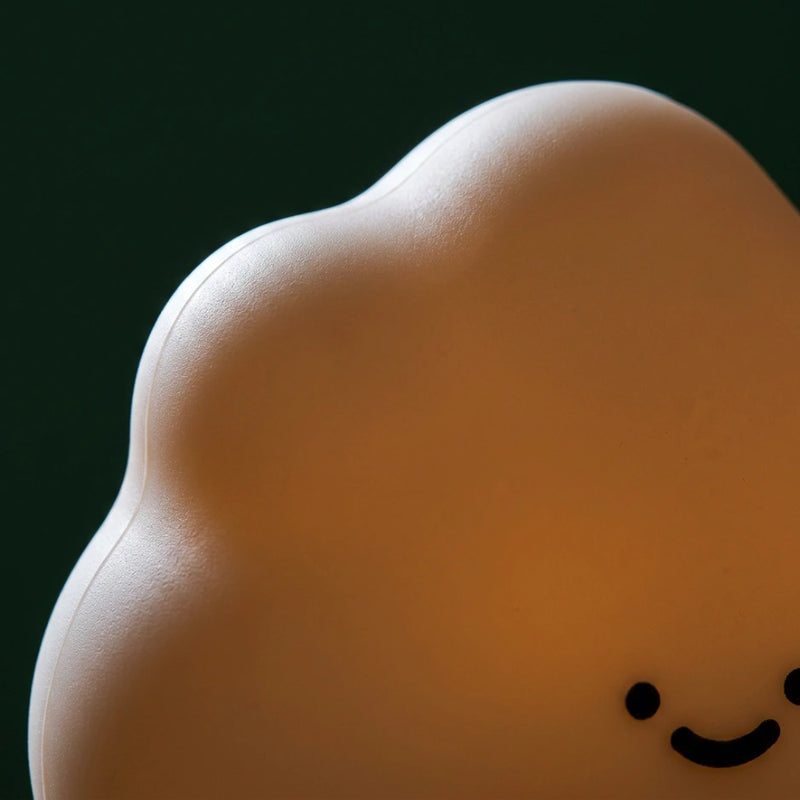 Détail texture silicone souple veilleuse nuage macro 4K surface matte translucide lumière ambre Tendre Veilleuse